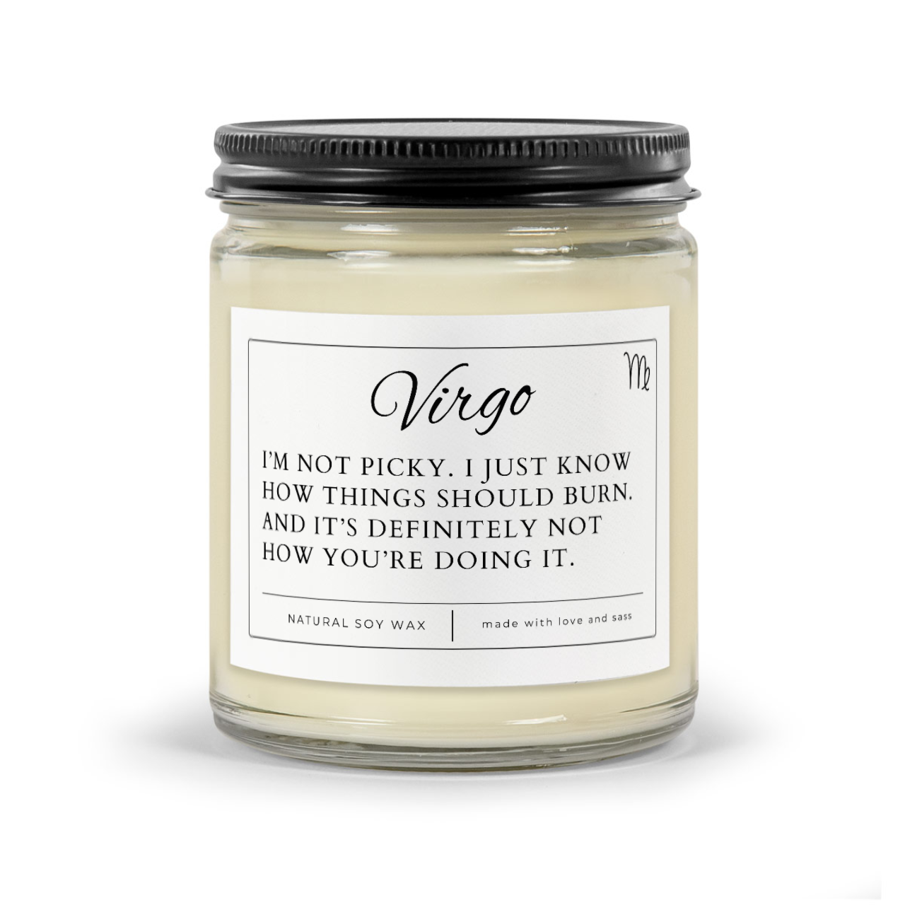 Virgo Zodiac Sign funny candle. White wax candle in clear 9oz glass jar with black matte lid. Label reads "Virgo - I'm not picky. I just know how things should burn. And it's definitely not how you're doing it."