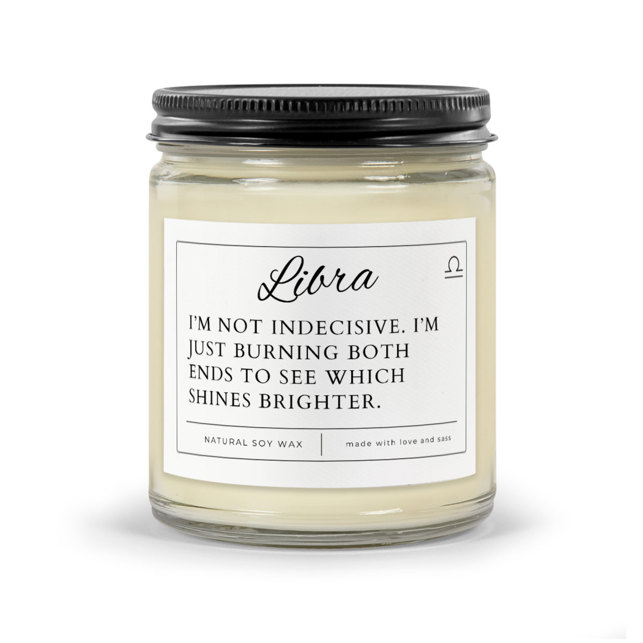 Candle Thumbnail - Libra Funny Zodiac Candle. White wax in clear 9oz jar with black matte lid. Label reads "LIbra - I'm not indecisive. I'm just burning both ends to see which shines brighter."